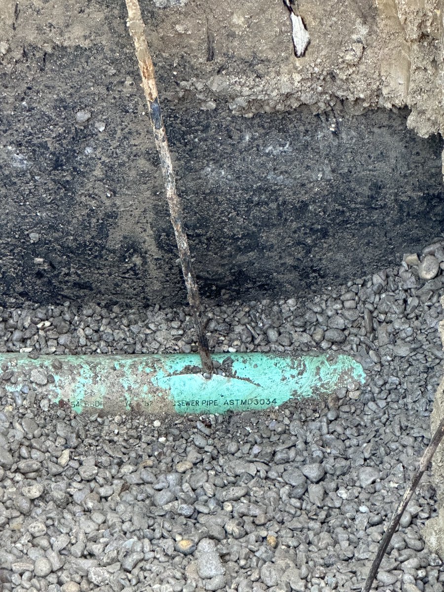 SewerCleaningCo's tweet photo. We fixed a sewer line with a grounding rod going through it! Talk about a shocking success! When you need the unexpected handled, call Sewer Cleaning Company! We're electrifyingly good at what we do!⚡️#pipe #dig #dirtyjobs #crackedpipe #piperepair #electrical #qualityservice https://t.co/iETwvdD2BK