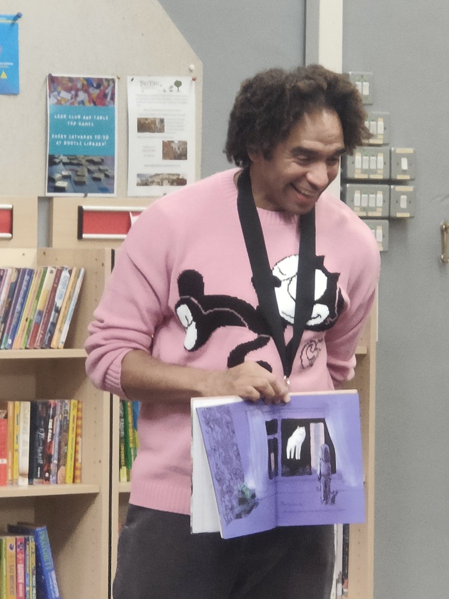 Its #LibrariesWeek, and we are thrilled to have welcomed Waterstones #ChildrensLaureate Joseph Coelho to Bootle Library this afternoon as part of his marathon library tour. 
He presented St Philip's Primary with the Bootle Summer Reading Challenge Cup and read to the children 📚