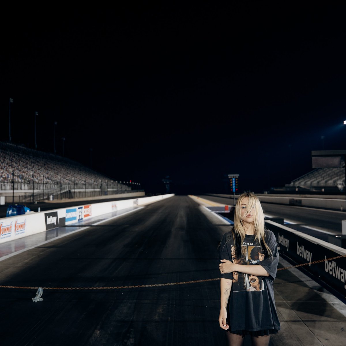 awonderland's tweet photo. I was at a race track so obviously I had to recreate my RUN album cover . How did I do https://t.co/vF9Qced7p7