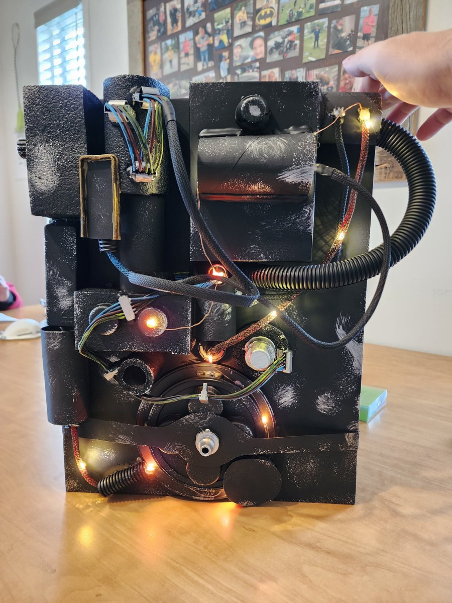Alright... Update on the proton pack!

This has actually been really fun to make. I've made almost everything from recycled material. Bought cheap lights, paint, and couple of other minor pieces. 

This thing is looking great haha.