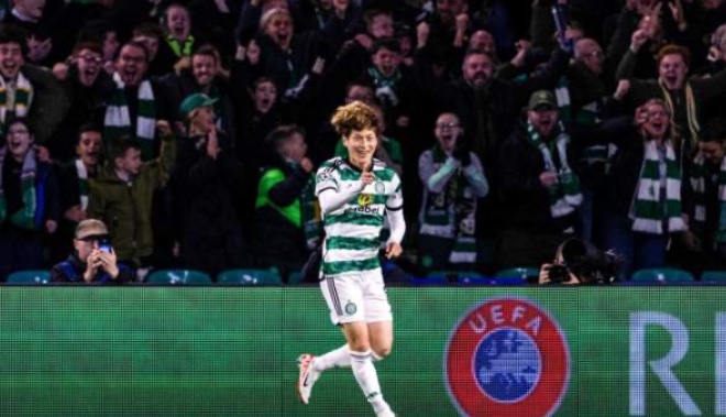 What UEFA by law has forced Celtic to change their socks tonight? No green band in the middle