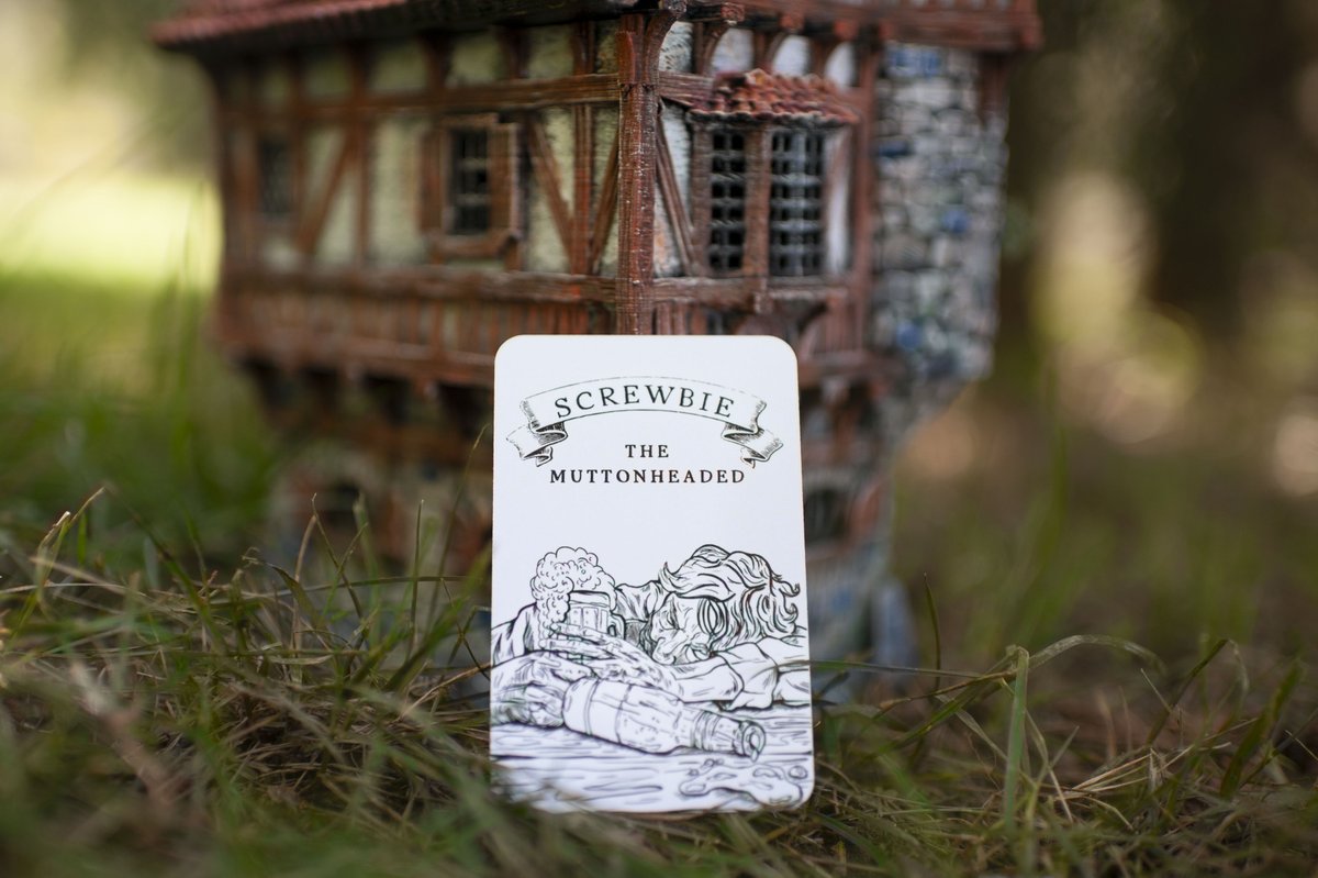 ModernProbsGame's tweet image. Meet Screwbie! Each round, put one of Screwbie&apos;s cards down with the rest of the players&apos; cards. If no one recognizes the card that won the round, you know that Screwbie won! This Muttonhead is included in every box.
#modernproblems #fantasysolutions#cardgame #game #gamenight