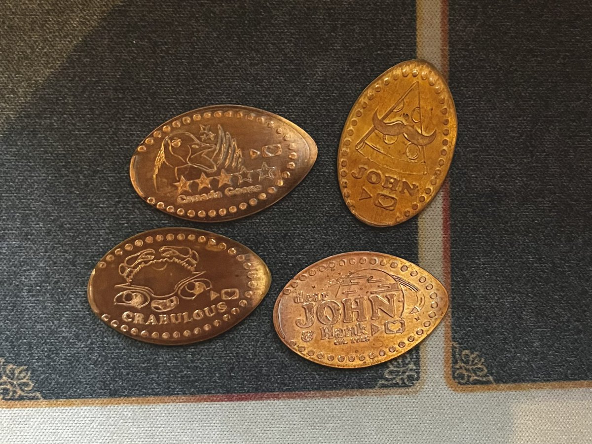 Finally got the pressed pennies I designed for <a href="/proj4awesome/">Project for Awesome</a>!