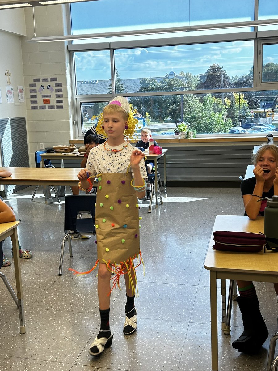 MmeCarter1's tweet photo. Last week, my grade 6s were tasked with applying our new clothing vocabulary to design &amp; create an outfit for @BrookeWanklin. Groups presented their model, using the verb “porter” to share each clothing item/accessory. A great start to a fun unit ahead. @BHNFrench @piustitans https://t.co/gJqrDM8I6l