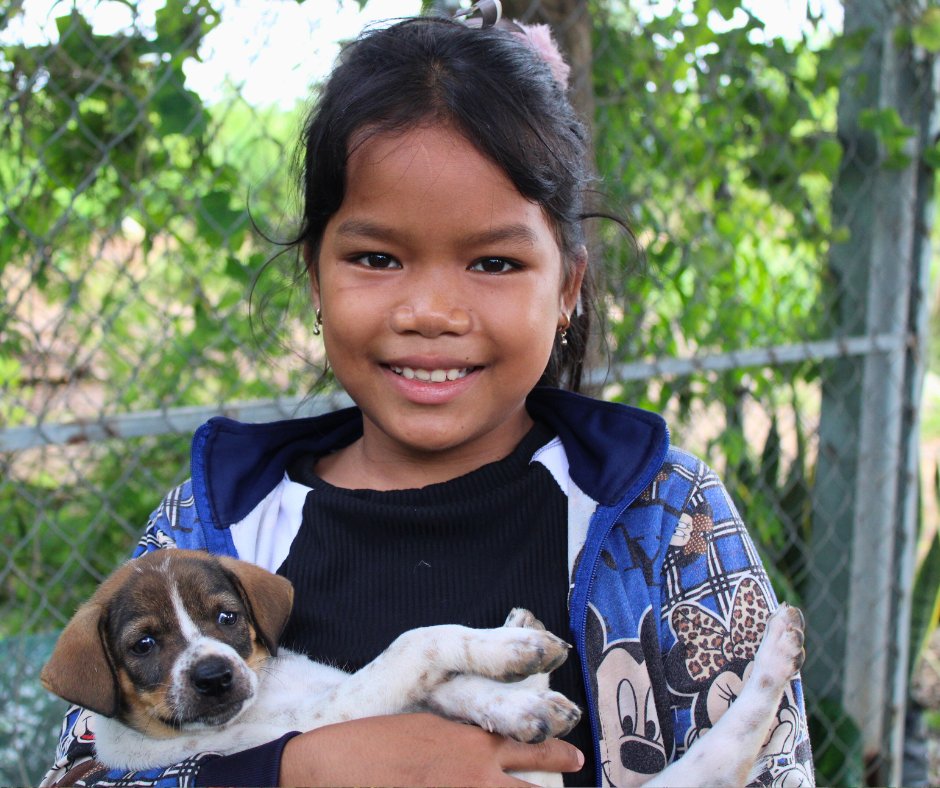🐶 New puppies have a magical way of melting hearts. ❤️ Gemma from our Cambodia foster care program loves caring for her foster family's new puppies!  🐾 Being responsible for the welfare of a pet is such a rewarding experience for Gemma and her siblings.

#puppylove #fostercare