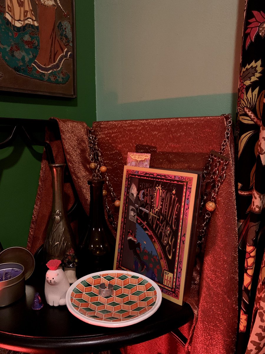 my copy of The Chromatic Fantasy by @dirtcup_art finally came in!! really really enjoying it so far, this book has delicious vibes and really speaks to me… I also found the perfect place to put it in my room, when I can manage to put it down 🌞🌚