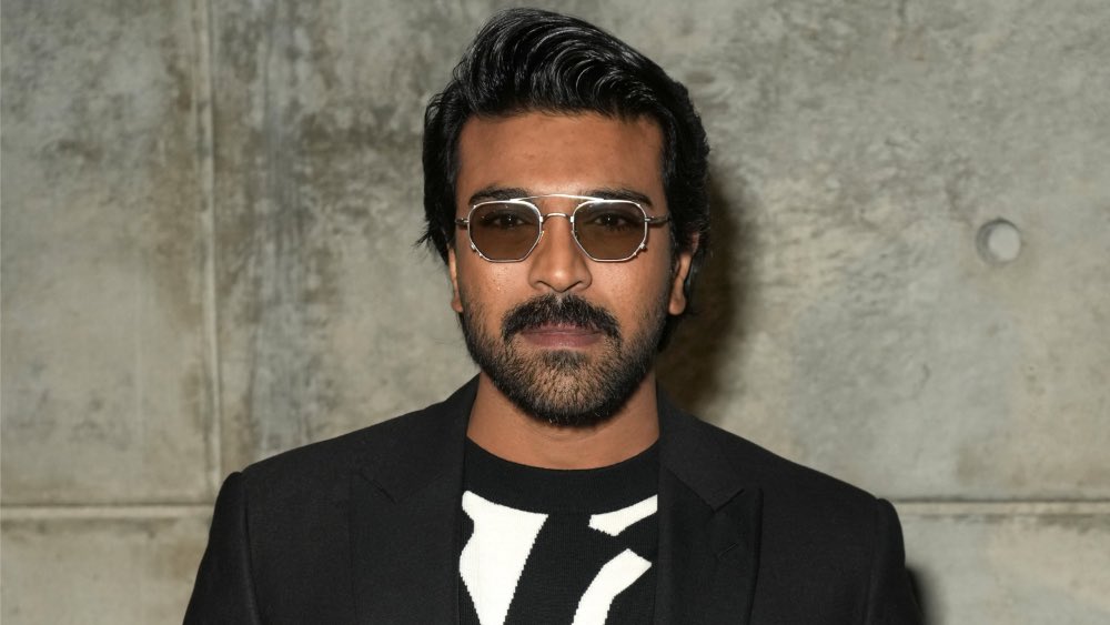 Ganeshen5's tweet photo. If Christopher Nolan really is making the new James Bond movies, then here’s my dream cast:

Ram Charan would make a phenomenal Bond 

Margot Robbie would be a great Bond girl

Robert Downey Jr. would kill it as Bond villain https://t.co/E70H19jW0t