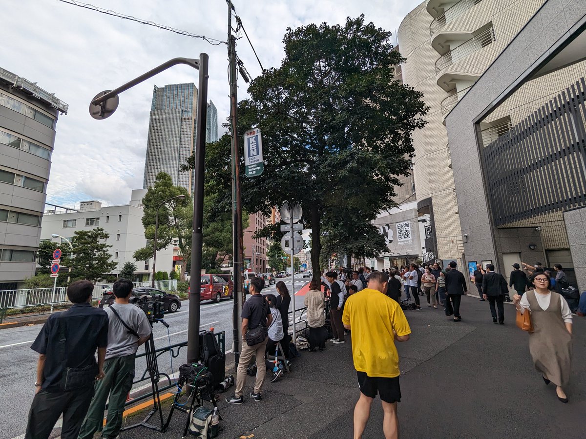 Media gather for the great de-Johnny's-fication of the disgraced talent agency's HQ in Nogizaka.