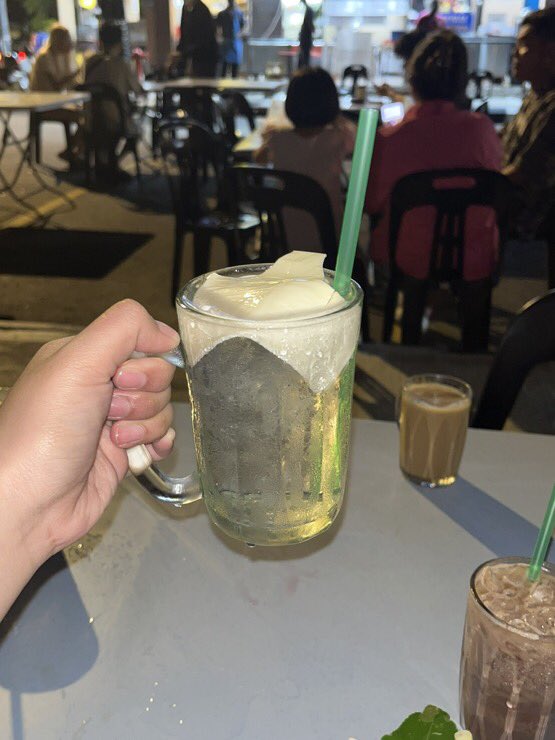 IzzraifHarz's tweet photo. went to Malaysia once and wtf the weather there was insane?? i walked around the city at 11am (it was already super hot) with clear sky and 10 mins later there was a thunderstorm 😭😭 what a weird country. but good food 👍🏻👍🏻 i really like maggi milo and ayer kosong cheese. https://t.co/8OdD9gSfW2