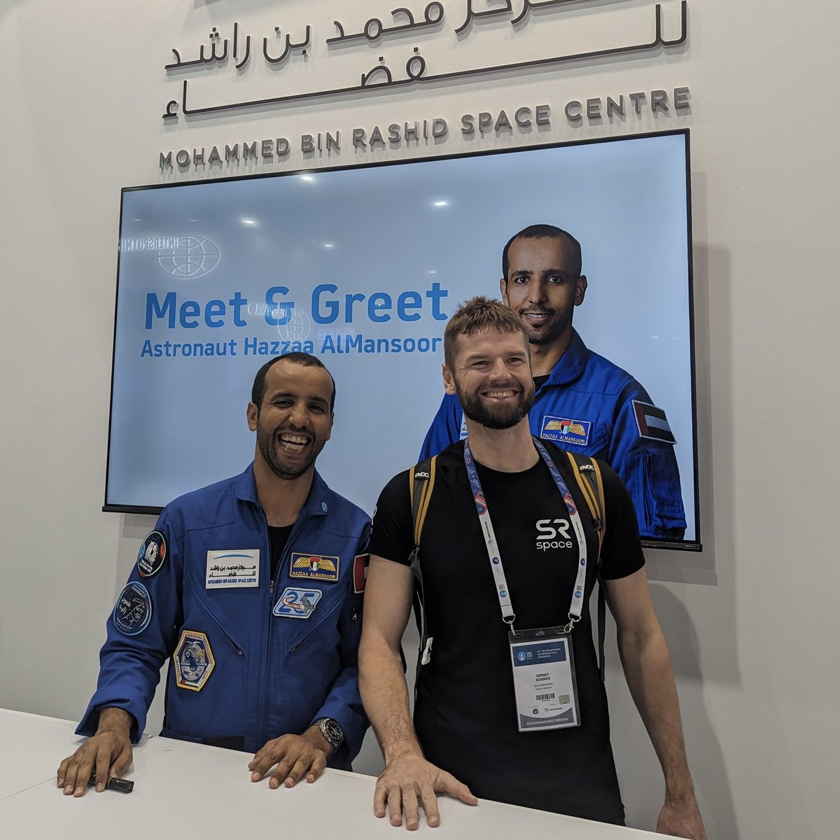 srspaceru's tweet photo. Yesterday at the UAE stand on the International Astronautical Congress we met the first UAE astronaut Hazza al Mansouri. He is very smiling and friendly. We took a good photos together and took souvenirs😍 @Iac2023 #IAC2023 https://t.co/pR5InyEVH4