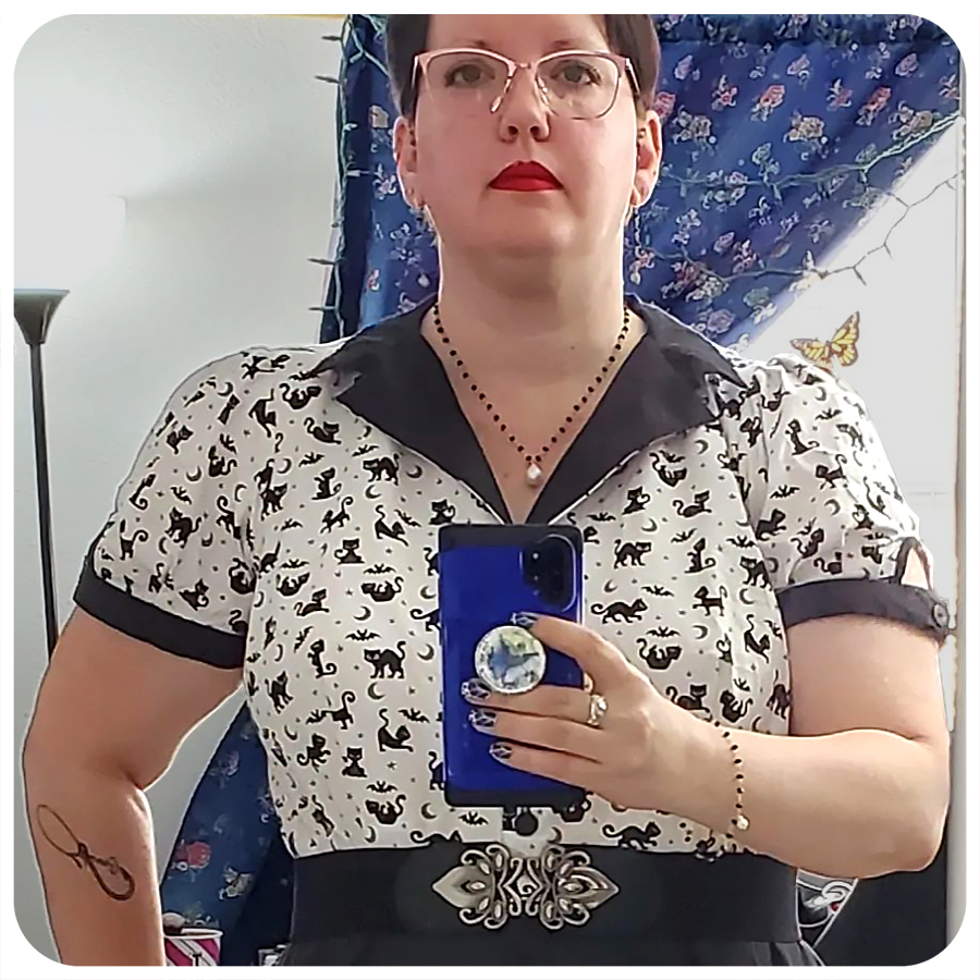 The way Jenette Tomblin used my #HipHalloween Black Cats fabric for her dapper dress is positively PURR-illiant!🐈‍⬛ #halloween #happyhalloween #halloweenfabric #glamourghoul #rockabilly #rockabillygirl #psychobilly #spookysewing #ilovetosew #blackcat #spoonflower #calebgraystudio