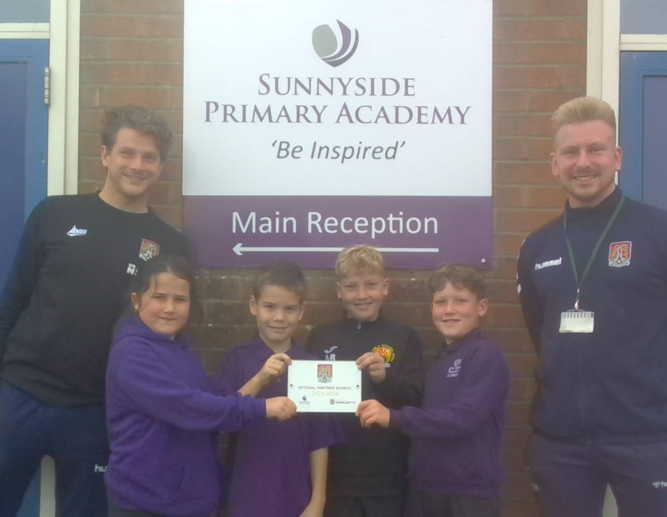 SunnysideAcad's tweet photo. Thank you to @NTFC_CT for our continued partnership with them. Today we have been presented with our new plaque. We look forward to working together for another year. https://t.co/nqIsKUdoIu