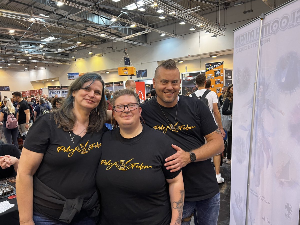 FragginUnicorns's tweet image. A hello from Essen (GamesCon) from @SchroedingersI and the Polyfeder Team. They are promoting the #SubversionRPG quickstart rules in german!!!