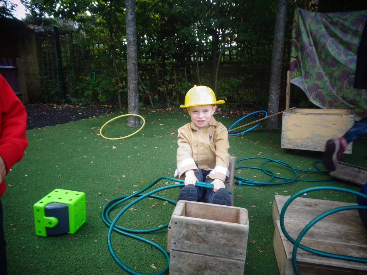 The reception children are inspired by their firefighter visit last week. They have set up a fire station in the outdoor area and have been building their own fire engines! <a href="/SurreyFRS/">Surrey Fire & Rescue Service</a>