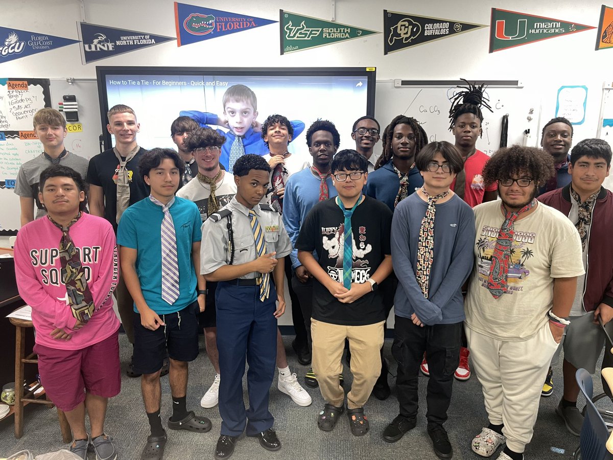 EastLeeCountyHS's tweet image. Our East Lee County High School Jaguars are not just about academics; they're about learning valuable life skills too! #ModelMen showing their classmate how to tie a tie. Empowering each other with style and knowledge. 👔 👏#LifeSkills #Teamwork #JaguarPride