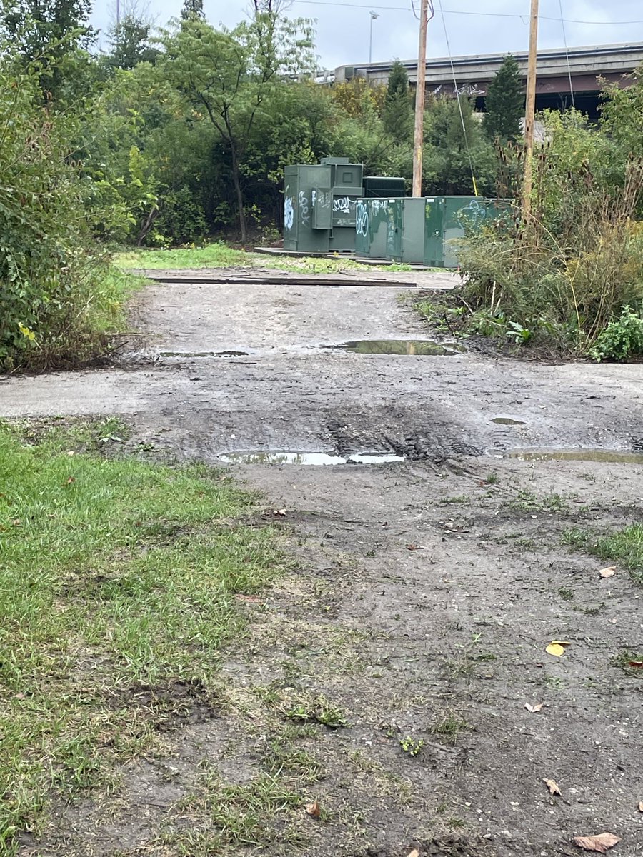 JLev8's tweet photo. ⁦@ComEd⁩ such a dangerous, slippery hazard your trucks have created in Skokie. Covering a paved trail in slippery mud- what could go wrong for bikers, walkers, joggers? https://t.co/OdmLCkTWBo