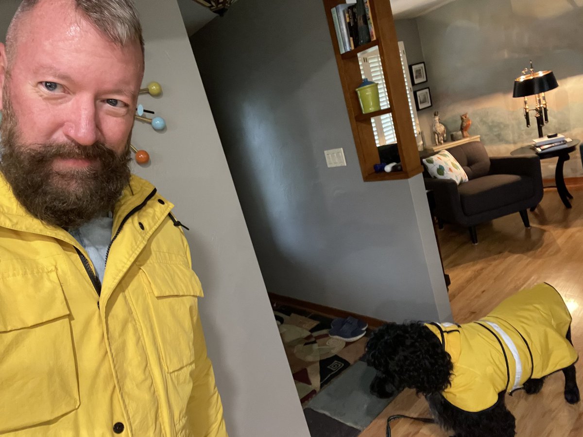 Humphrey doesn’t seem too impressed with our matching raincoats.