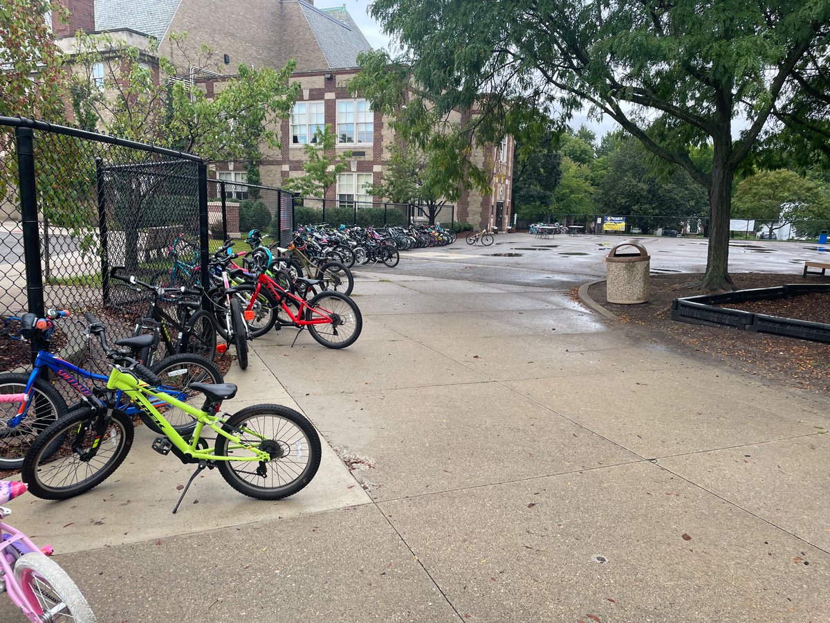 ambrozym's tweet photo. How the bike racks of an elementary school should look! This photo was taken somewhere in North America. @notjustbikes #biketoschool https://t.co/cp3VQub4br