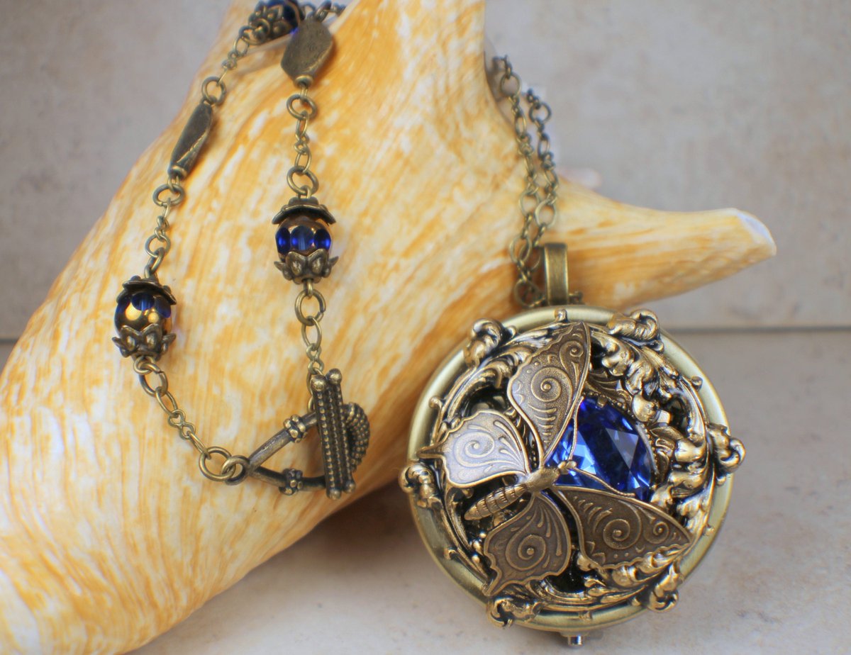 Blue Crystal Butterfly Music Box Locket tuppu.net/a7e155bc #Char'sFavoriteThings #Shopify #Butterflynecklace