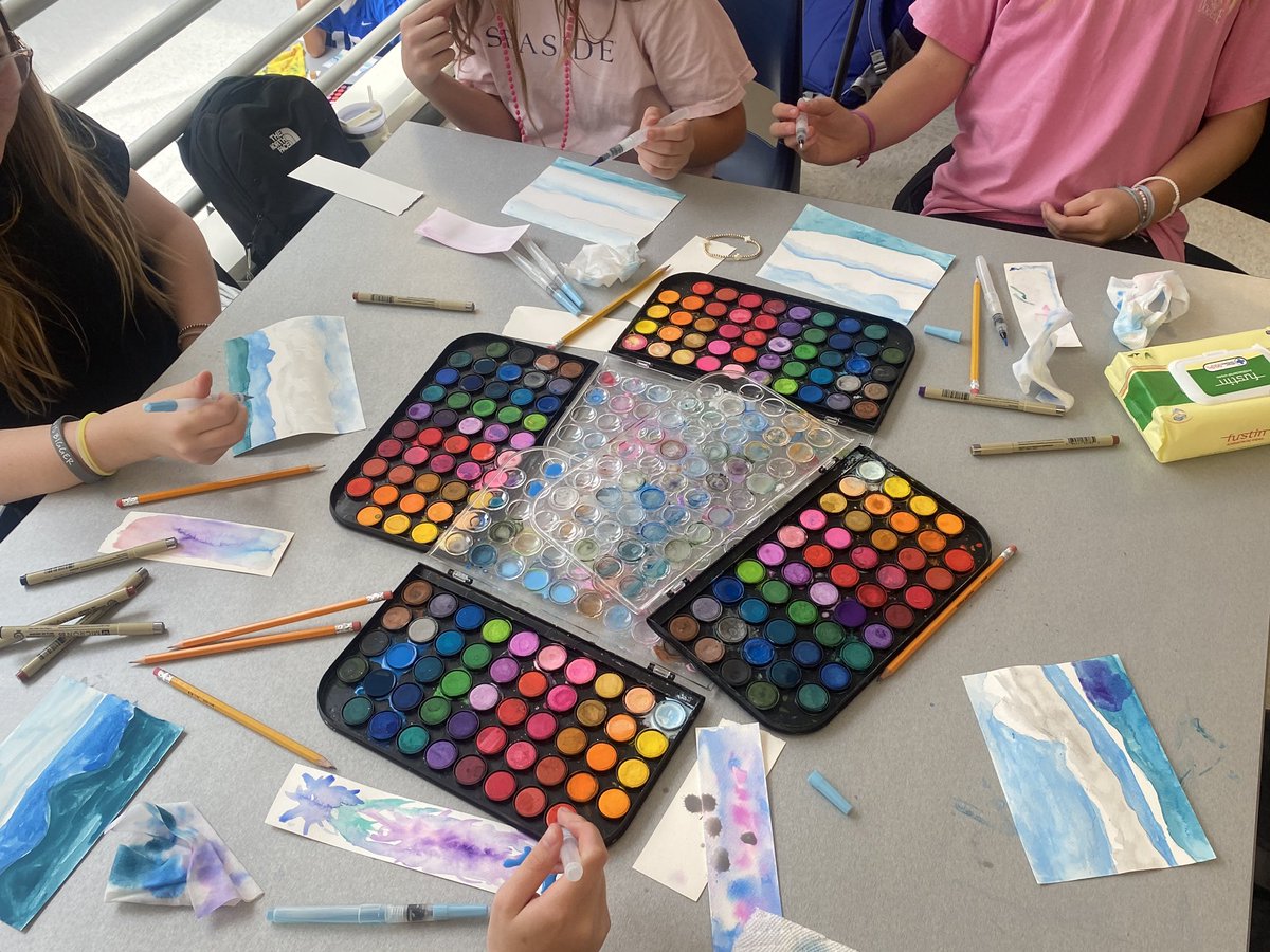 Creative work with water color. Art classes combined to paint with a guest artist today!