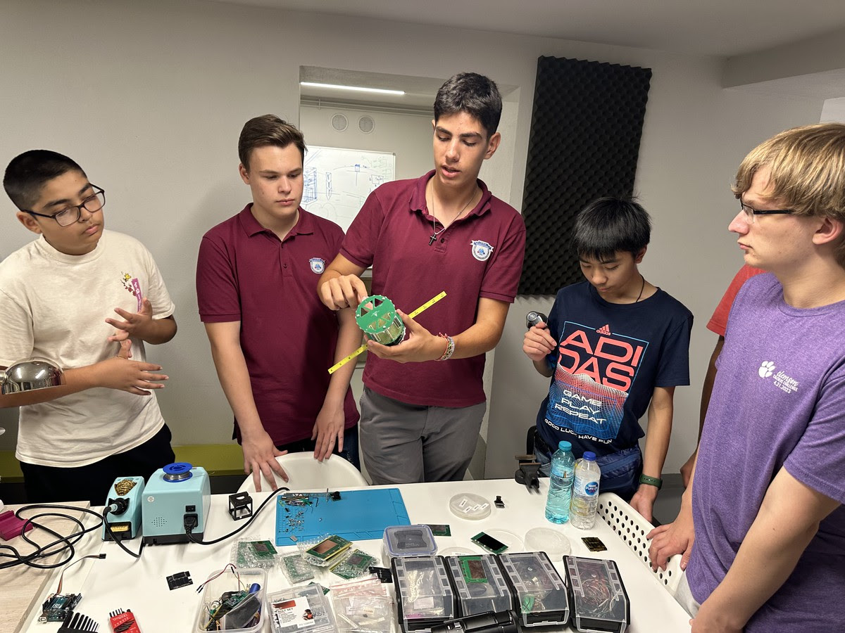 FSAPrivate's tweet photo. Our FSA Satellite Team's fall trip to Bucharest was a blast! Collaborating with our sister school, they dived into satellite tech, explored a ground station, and even intercepted real satellites. Here's to more space adventures! https://t.co/ZP7gPe6eI0