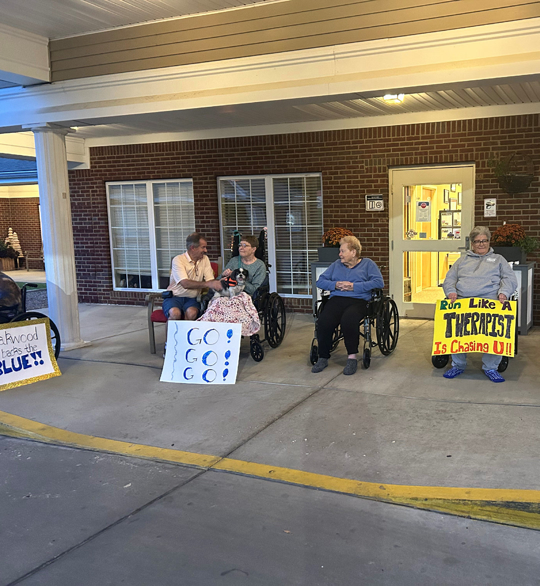 OakwoodHC's tweet photo. Oakwood Residents showed their support and pride Saturday evening to cheer for the "Run for the Cops". #TrilogyLiving https://t.co/JlpJGVNwKt
