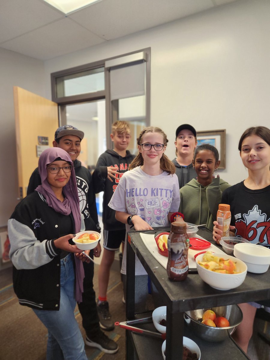 All smiling faces with permission! It's World Teacher Day, and we do it all because of these lovely faces- every day, no exceptions. Feeding us Apple Nachos? Yes, please! #WorldTeachersDay2023 #WeAreCBE