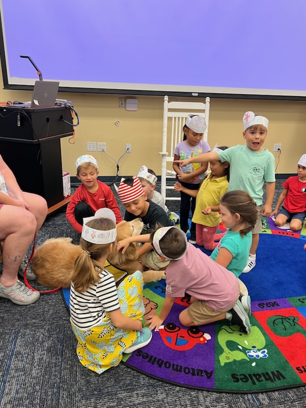 Kindergarteners continued their study of community helpers. Today, Vic and her handler, Andrea, joined us to talk about Vic's job as a therapy dog. #LoveLeeSchools #WeAreSanibel #SanibelStrong