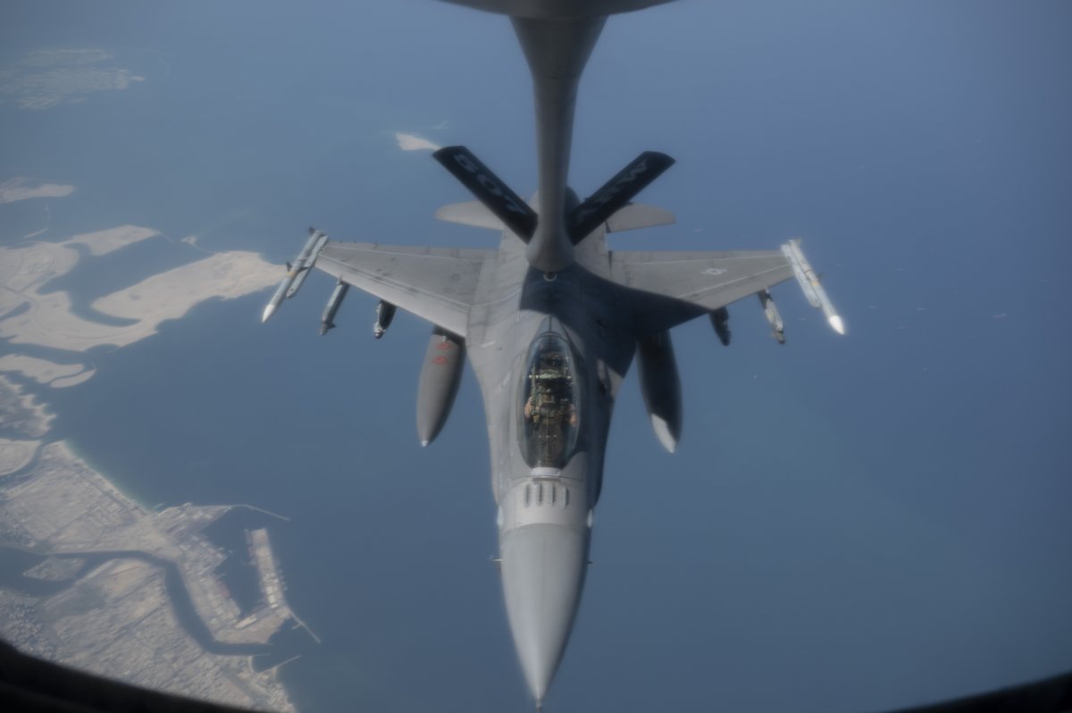 A U.S. Air Force KC-135 Stratotanker delivers fuel to an F-16 Fighting Falcon above the #StraitofHormuz, Oct. 2, 2023 #PeoplePartnersInnovation