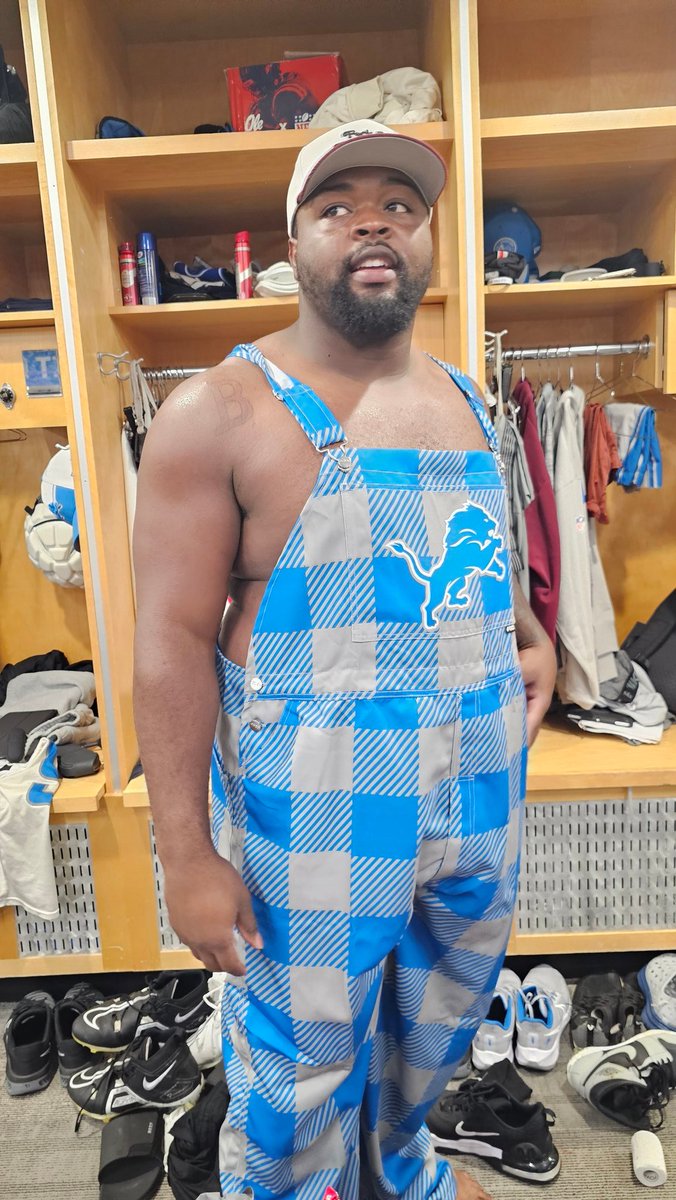 Justin_Rogers's tweet photo. If you were wondering whether Benito Jones ordered custom Lions plaid overalls, the answer is yes. https://t.co/C1U6paTP7H