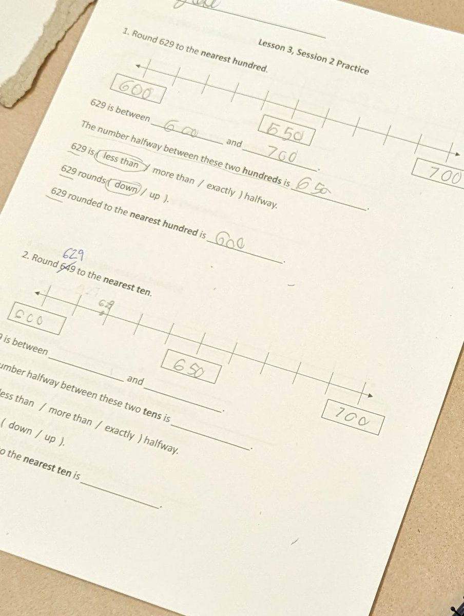 Day 21: Today's math lesson opened with a review of identifying between what two ______s a number is located. Then we started moving into using these boundary numbers to help us round numbers. Small steps, but we're moving in the right direction of understanding!