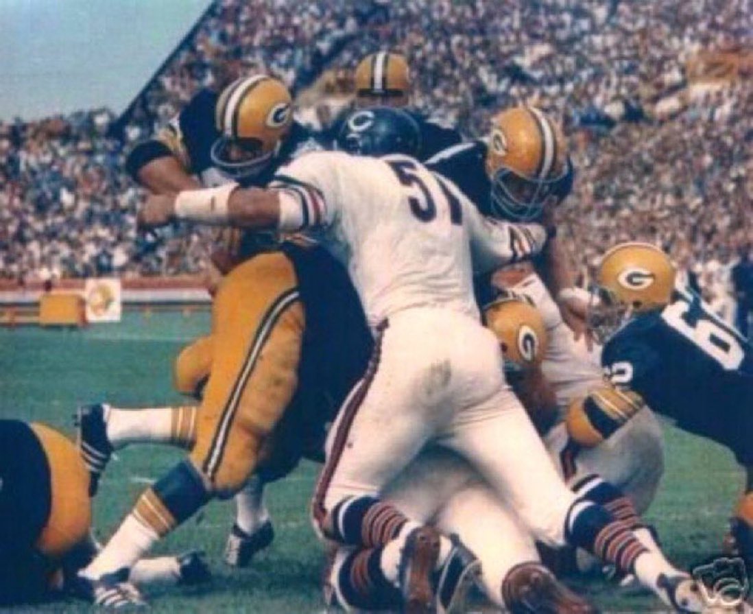 Fitting photo of one of the best linebackers in NFL history, Dick Butkus of the Chicago Bears 🐻. 
If you look close he’s actually tackling 3 Packers at once. The undisputed leader of the original “Monsters of the Midway.” Loved watching him play from sideline to sideline. RIP 🙏