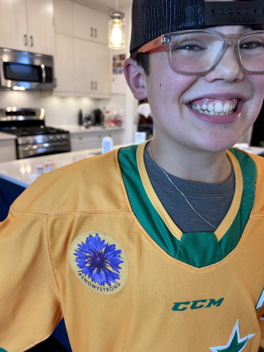 My Calgary Northstar came home with this jersey today. Look at that smile. Find a family like the hockey family. 💛