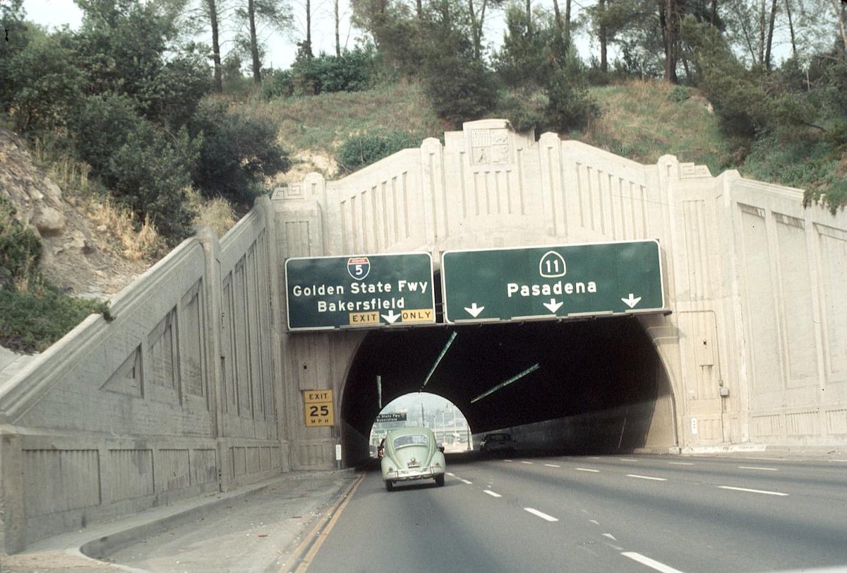 JimShull's tweet photo. This tunnel on the old State Route 11 served as inspiration for the tunnel at the launch of Rock n Roller Coaster WDW. Except the date at DHS was birth year of WDI. #WDW https://t.co/Dx65X7reIt