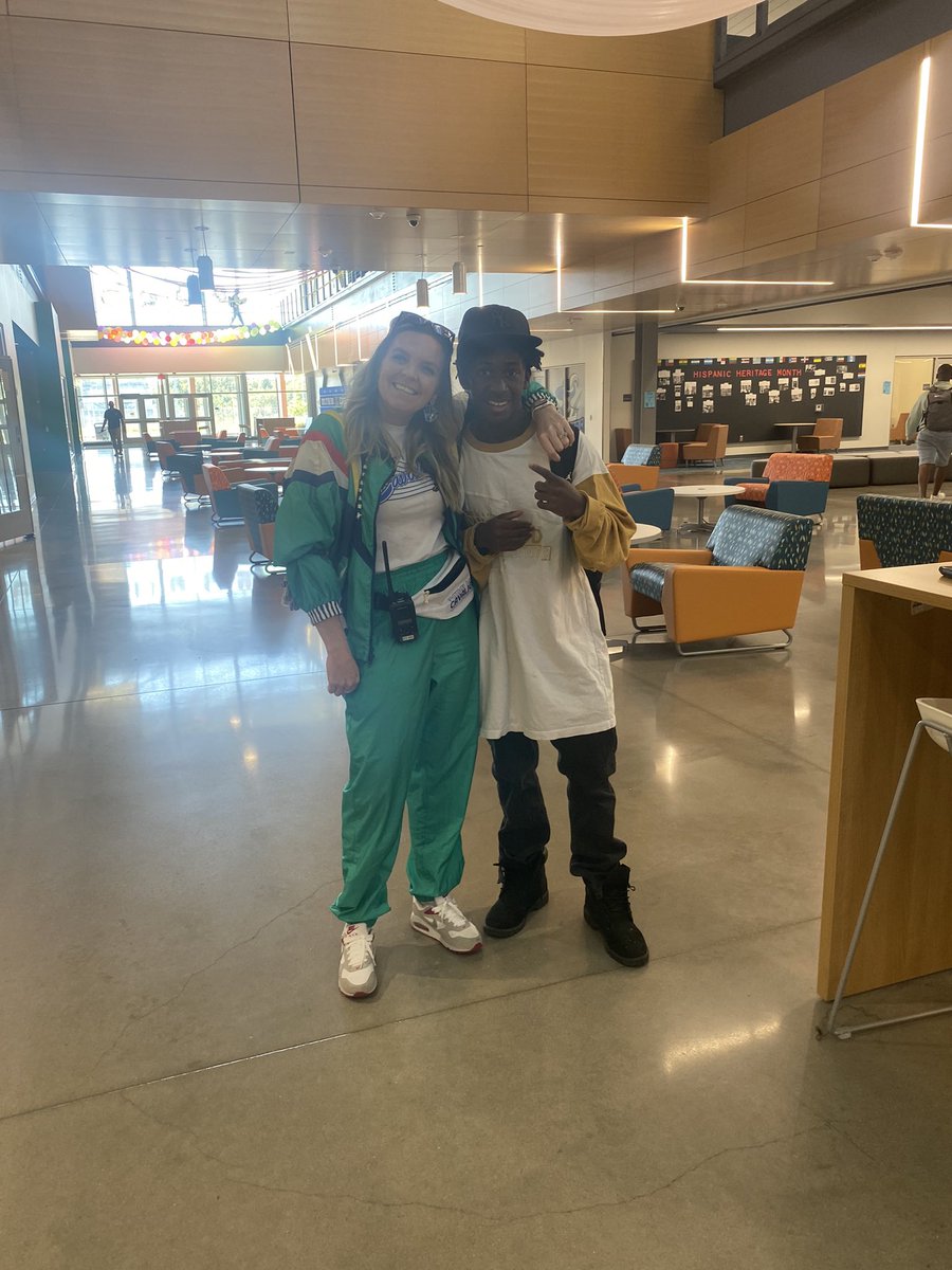 Today was 90’s Day!! I look like my Mom… everyone else looked totally tubular!! #ProudToCallOurHomeCC #GoCavsGo