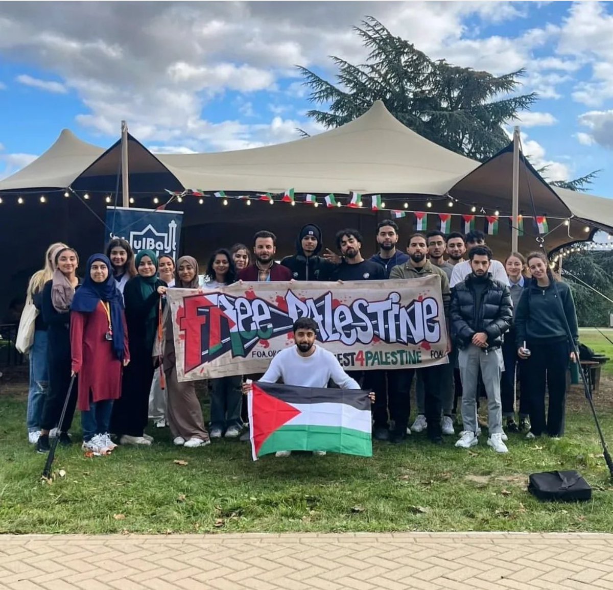 OnlinePalEng's tweet photo. UK activists at the University of Kent in England held an event to expose Israeli apartheid crime against Palestinians, raising awareness about the Palestinian cause. https://t.co/I8icZ1QCIy