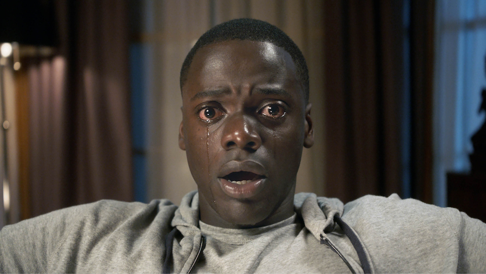 netflix's tweet photo. Grab your tether and sink into the couch because Get Out and Us, both from writer/director Jordan Peele, are coming to Netflix in The US... at midnight tonight!!! https://t.co/KfnmKGrcAY