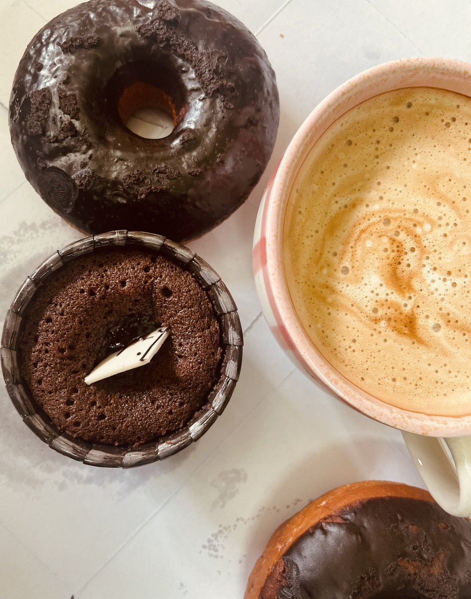 Starting the day with a delightful trio - warm chocolava cake, fresh donuts, and a steaming cup of coffee. ☕🍩🍰 #BreakfastGoals #MorningIndulgence