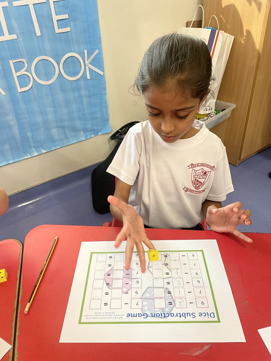 GayatriKakade16's tweet photo. Children learned subtraction with a roll of the dice! #dynamicdolphins @NMSKindergarten https://t.co/nId8Cl42lv