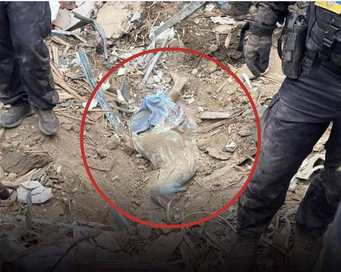 katalina_ada's tweet photo. In Kharkiv, a boy's body wrapped in a blanket was found under the rubble.

The child may have been asleep. Or maybe it was just cold and she was wrapped up.

At a moment of feeling safe in a civilian environment, the russians killed this 10-year-old child. https://t.co/1SaDmGVfLB