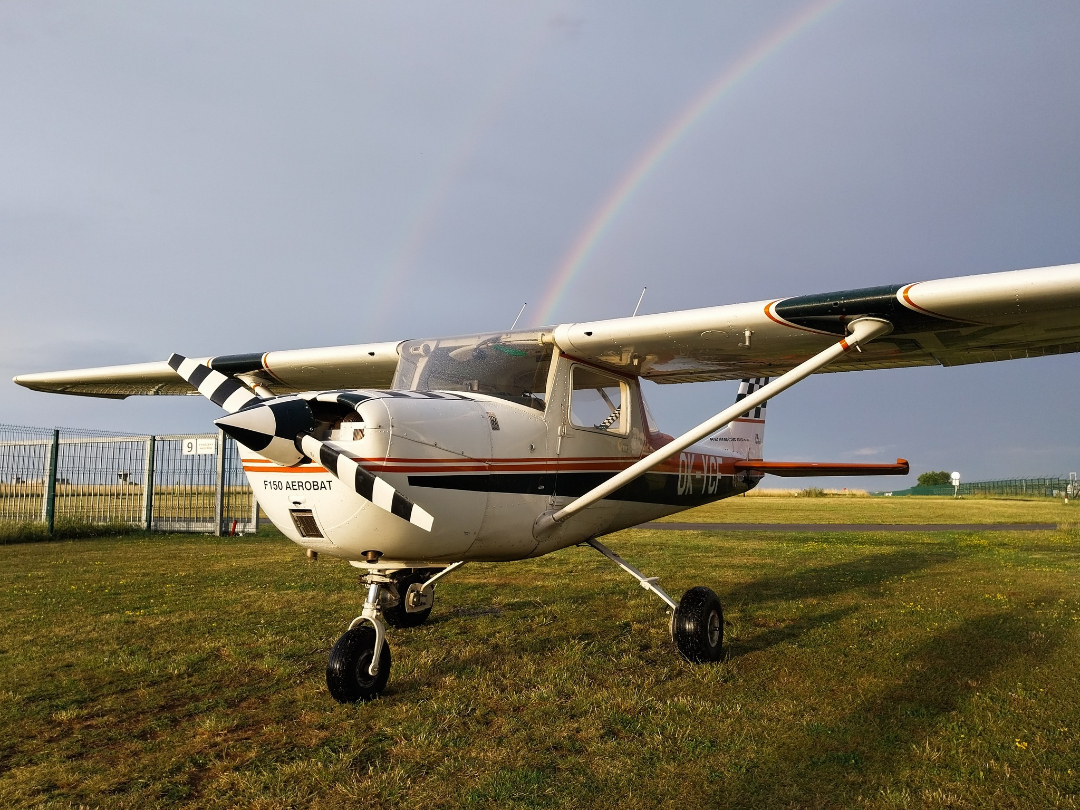 volantis4pilots's tweet photo. The Cessna 150, a classic and reliable aircraft, stands on the ground, while the rainbow gracefully stretches across the sky behind it, painting the scene with its brilliant colors.
 #cessna #cessna150 #aircraft https://t.co/VhjIivCDx2