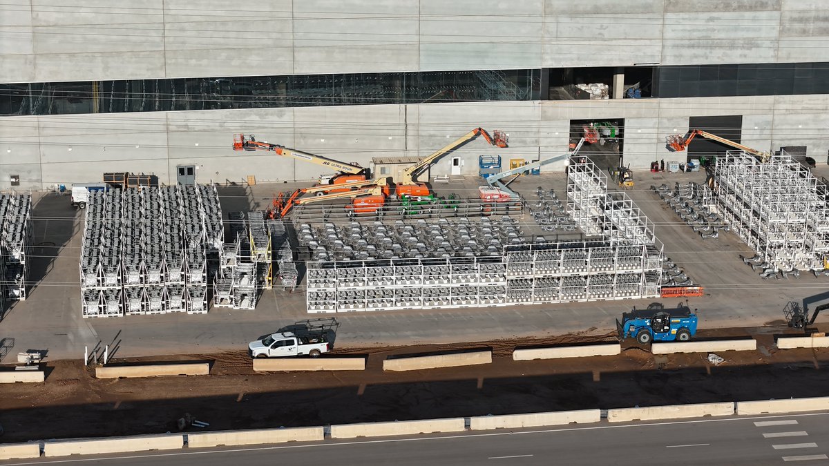 JoeTegtmeyer's tweet photo. Big News at Giga Texas on this 6 Oct 2023! If you are a short term analysts looking to fill a spreadsheet, or someone looking for a flashy new Cybertruck on the outbound lot, you just won't understand the milestone these images represent. Hint, we have never seen this many Cybertruck F & R castings ... ever. What could this mean?
