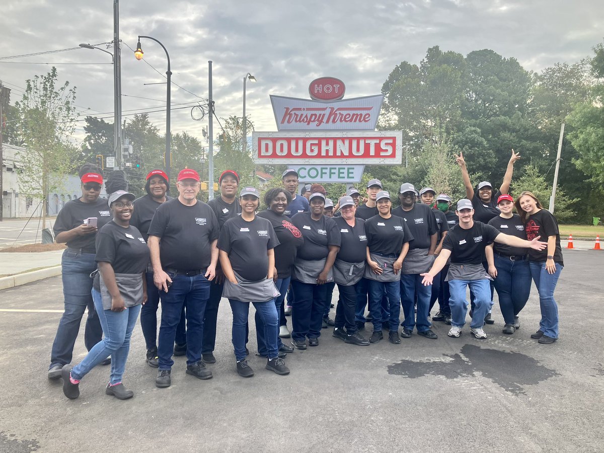Rebekka_Schramm's tweet photo. Coming soon! @KrispyKreme execs cut the ribbon on the new “Shaq Shop” on Atlanta’s Ponce de Leon Ave., after an arsonist destroyed the original building. And yes, they kept the iconic sign! Opens Tuesday! @ATLNewsFirst #KrispyKreme @SHAQ https://t.co/uHRezJh4JV