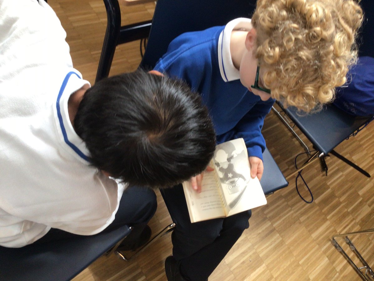 Our first buddy time of the year - sharing a book together #JSLYear5 #JSLYear3 #BSNBuddyTime