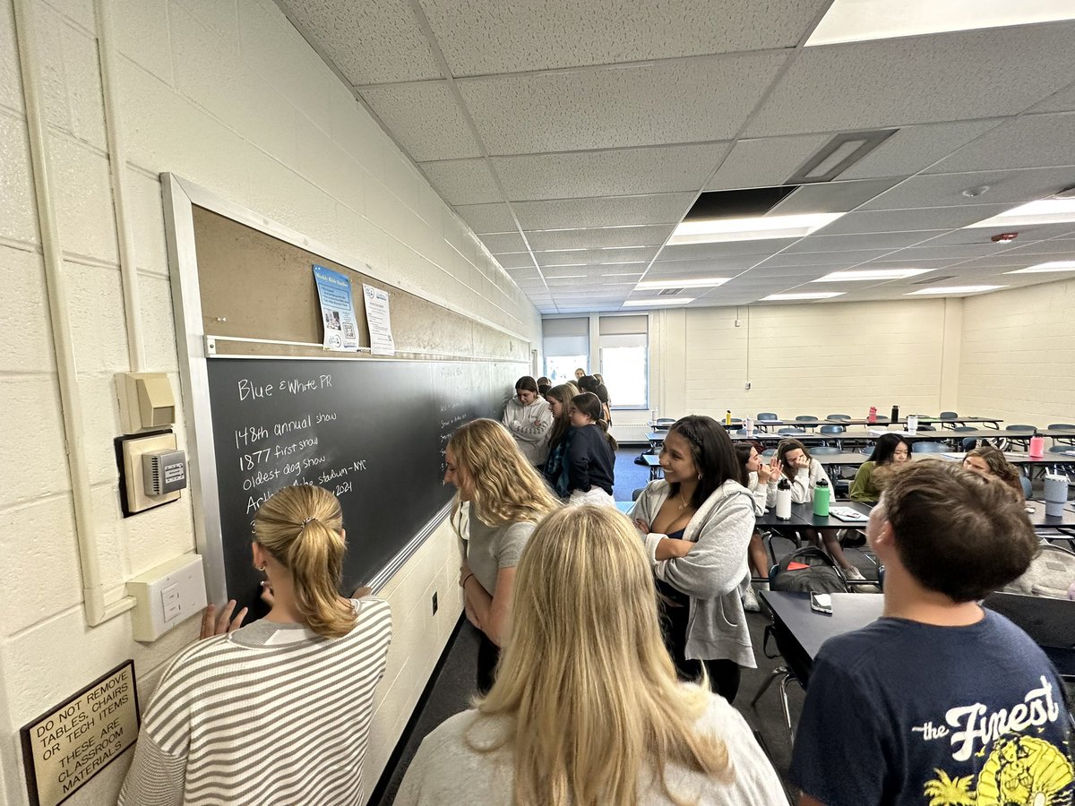 ProfNichols's tweet photo. Yes, we have a chalkboard in our @penn_state class. (And, yes we use it.) Students competing in teams to list everything they know about their @FOXSportsU client @WKCDOGS #WeAre @PSUBellisario #PSUPR372 https://t.co/yVul3EYEdE