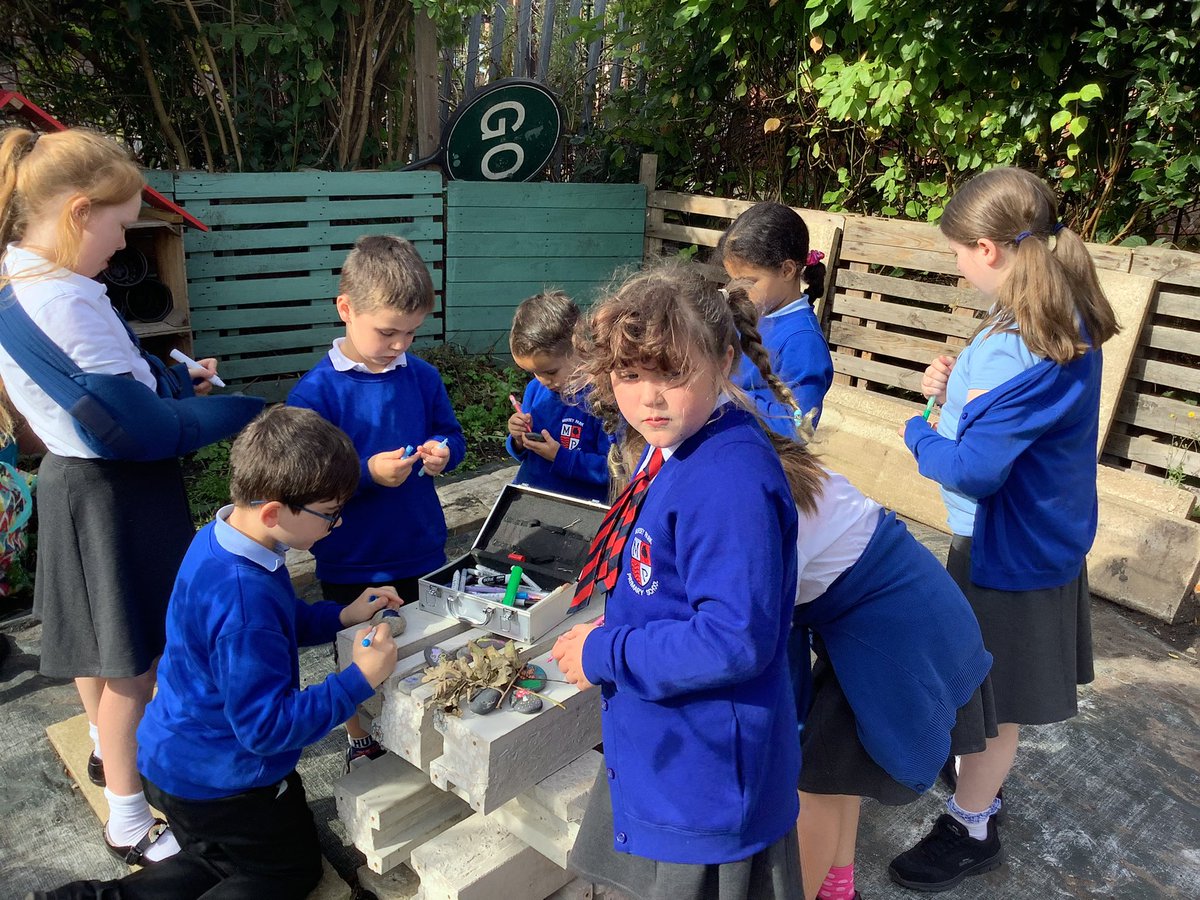 MPPS_Wirral's tweet photo. Eco Team Update - today we were back at the school allotment to make a start on our scarecrow- look at those legs! We also decorated pebbles to add to the bug hotel, along with plant pots and twigs and sticks. https://t.co/XpaPatb09q