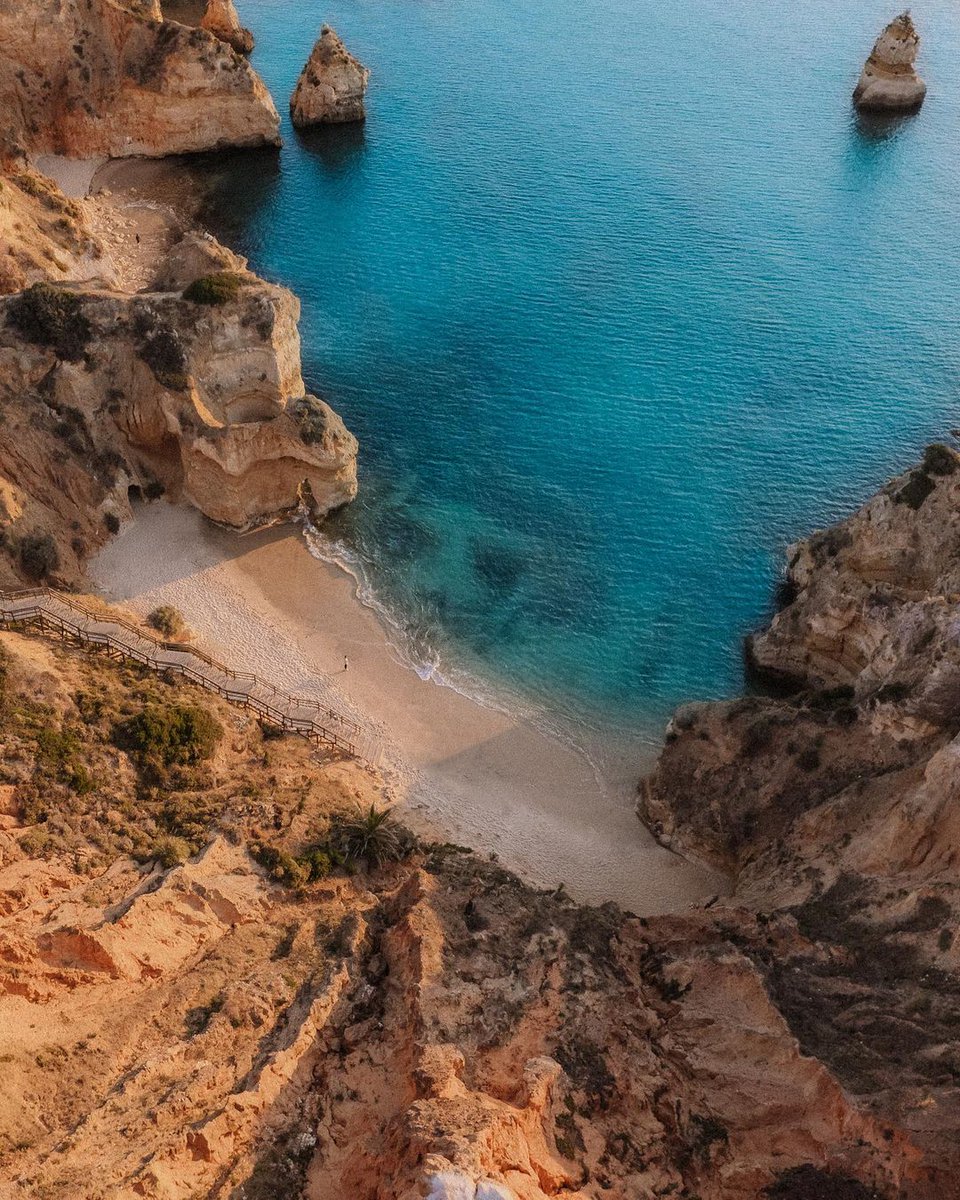 Whether you're a sun-seeker or an adventure enthusiest, there's something for everyone in #PraiaDoCamilo. In and amongst stretches of fine sand and pristine coast, it's the perfect place to enjoy swimming in total tranquility.⁣

#ThisIsLiving⁣

📸: @travelifejournal⁣