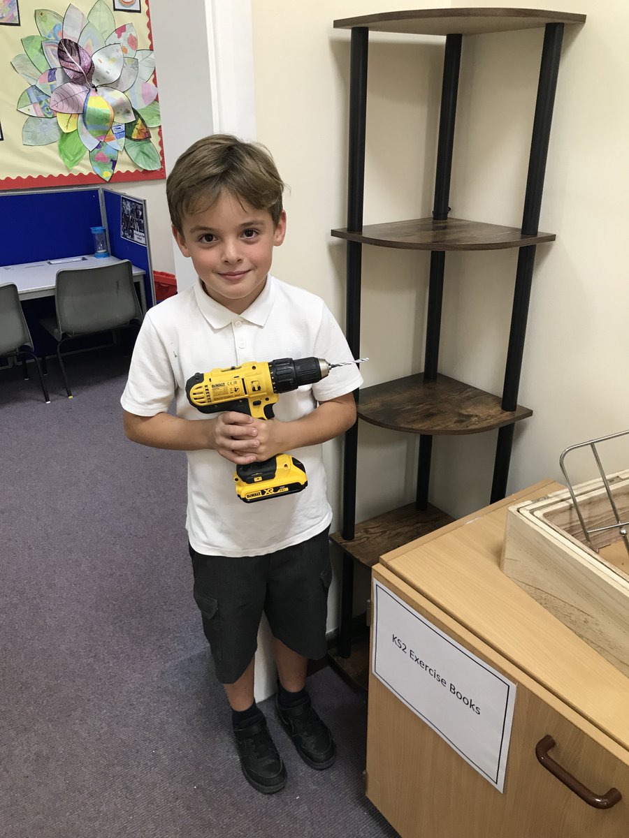 This young man was very proud to help Mr Murray, our caretaker, put these shelves together for our gallery during Friday afternoon club. #DIY