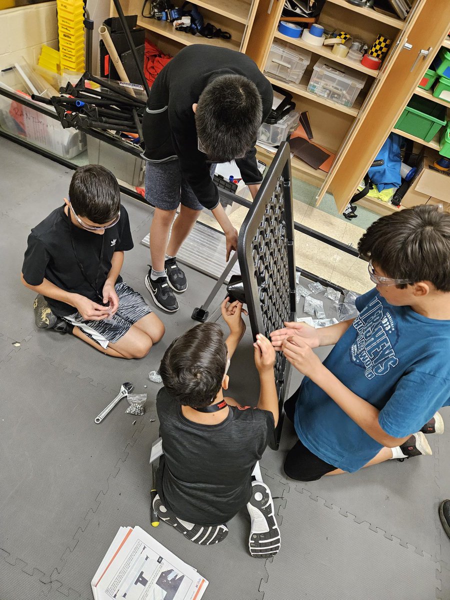 Plainedge Middle School FTC 7662 Dragons Robotics hard at work building the Center Stage game elements and planning the new robot build with Mr. Kowalik.