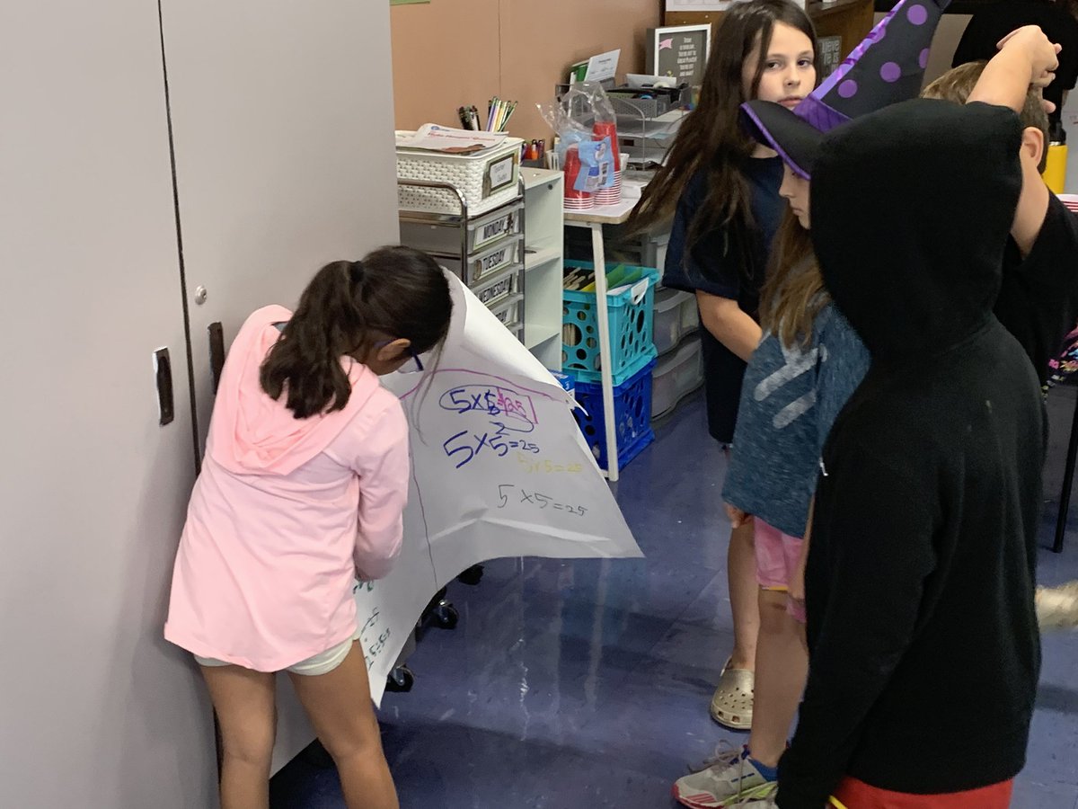 EricS_YES's tweet photo. Third graders sharing their “sweet” solutions to M&amp;M division during a gallery walk  in Ms. Matthews’ third grade class. https://t.co/dSjiUMRdAc
